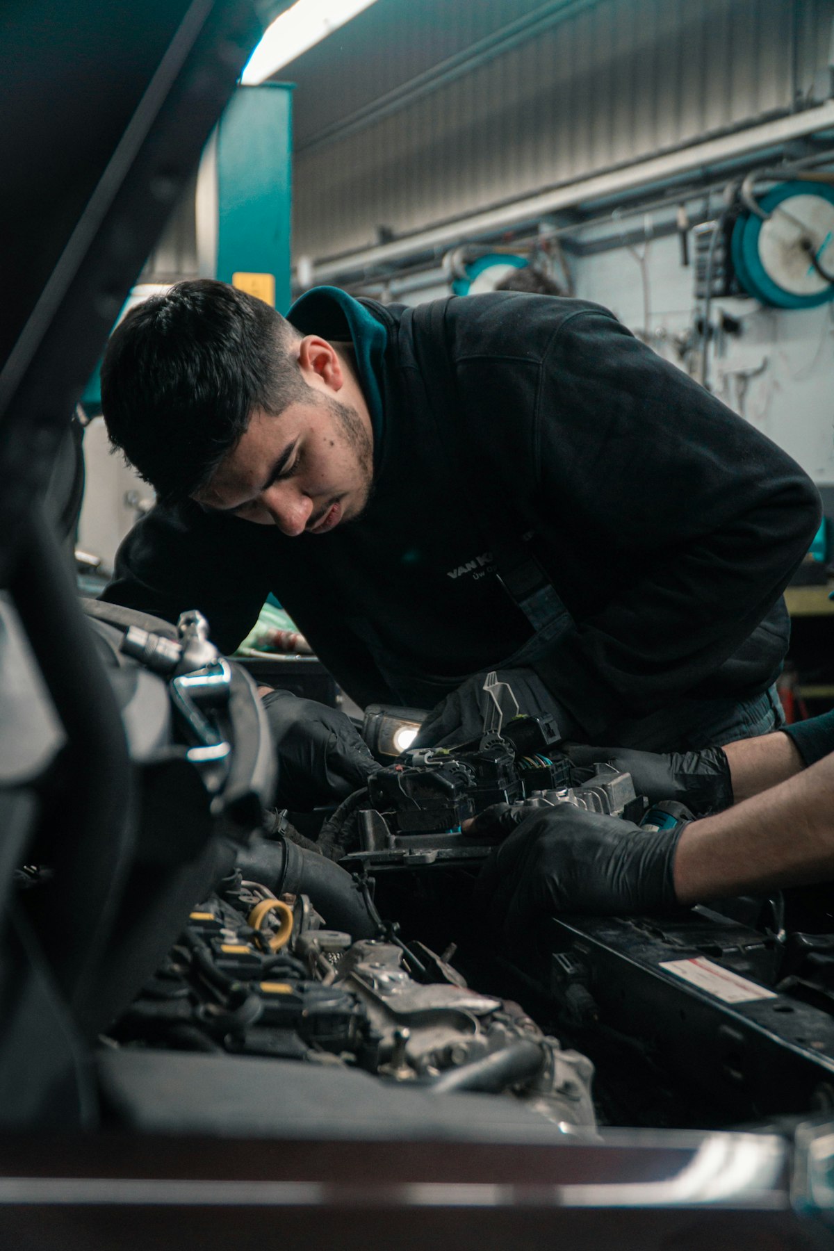 Technician working on a vehicle at Rockbrook Crash Repairs, Rathfarnham